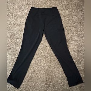 Duluth black stretchy pants. Size Small 29